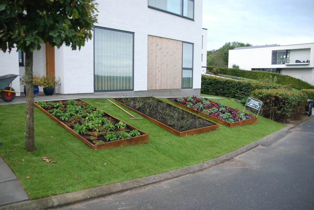 Inspiratie voor het gebruik van plantenbakken in de tuin